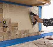 Wall tile installation by expert